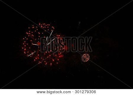The Celebration Colored Firework Flashing In The Black Night Sky