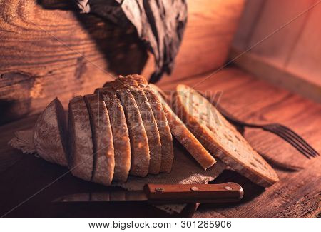 Rural Still Life With Homemade Bread On Rustic Background In The Morning Light
