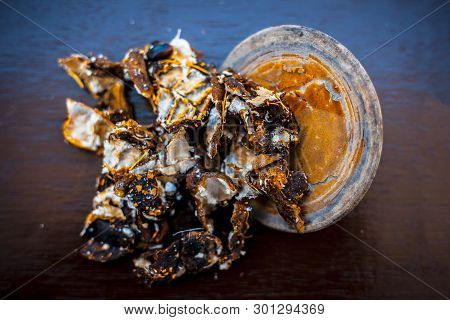 Raw Peeled Tamarind Or Imli In A Clay Bowl On Wooden Surface.