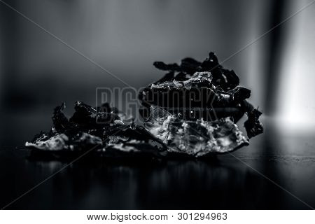 Raw Peeled Tamarind Or Imli In A Clay Bowl On Wooden Surface.
