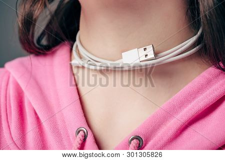 Partial View Of Young Female With Usb Cable On Kneck Isolated On Grey