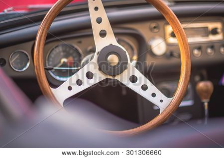 Classic Vintage Car Interior, Close Up On Steering Wheel, Dasboard, Retro Effect