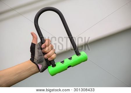 Lime green bicycle U- lock. Bike protection.
