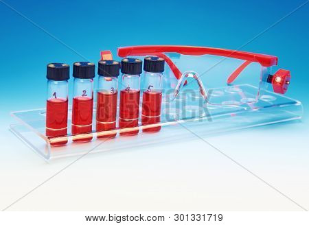 Biological Or Medical Samples And Safety Glasses On Blue Gradient Background