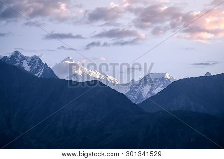 Sunrise Over Snow Capped Rakaposhi Mountain Peak In Karakoram Range. View From Jutial, Gilgit Baltis