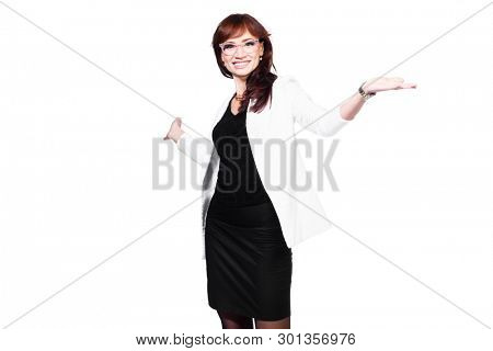 A portrait of a beautiful woman wearing classic clothes and posing over the white background in the studio. Beauty, fashion, business.
