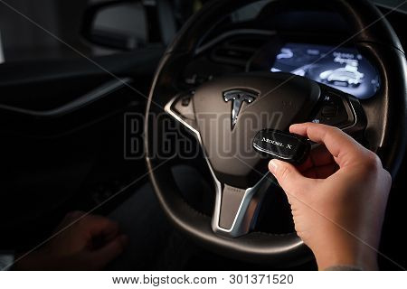 Key Of Tesla Model X. Steering Wheel And Navigators Inside Of New Tesla. Kyiv, Ukraine, F-drive Show