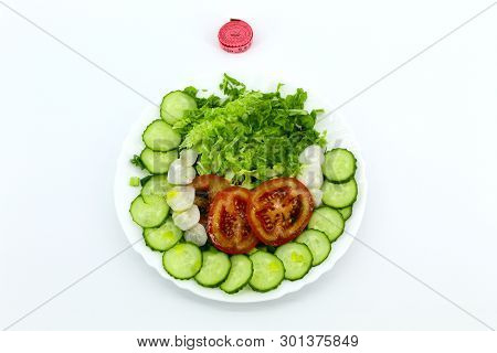 Vegetable Salad In White Plate On Light Background. The View From The Top. Above It Is A Pink Measur