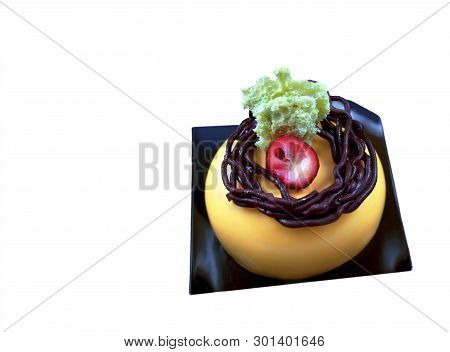 Orange Mousse Dessert With Chocolate Nest Decoration, Cranberry And Pistachio Sponge