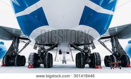 Chassis Cargo Aircraft Boeing 747. Airport In Winter.