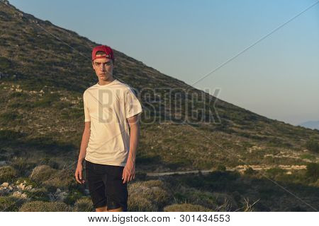 Mediterranean Mountain Landscape With Portrait Of A Young Man