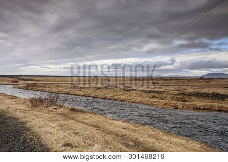 The Seljalands River In Iceland Flows From The Stratovolcano