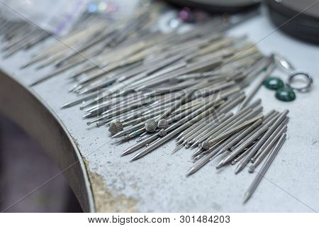 Workplace Jeweler In The Process Of Creating Jewelry