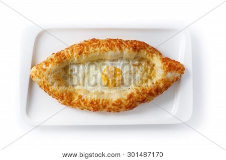 Adjar Khachapuri In A White Plate On An Isolated White Background