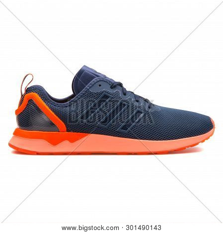 Vienna, Austria - August 10, 2017: Adidas Zx Flux Adv Blue And Orange Sneaker On White Background.