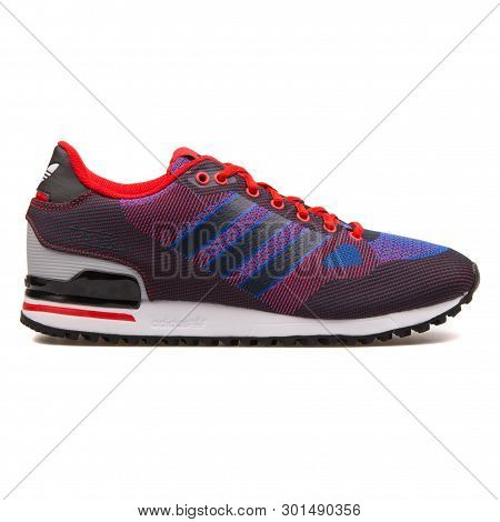 Vienna, Austria - August 10, 2017: Adidas Zx 750 Wv Red And Blue Sneaker On White Background.