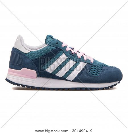 Vienna, Austria - August 10, 2017: Adidas Zx 700 Blue, Green And Fuchsia Sneaker On White Background