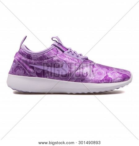 Vienna, Austria - August 10, 2017: Nike Juvenate Flowers Print Lilac And White Sneaker On White Back
