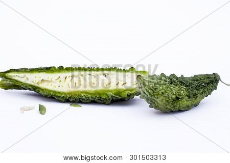 Raw Organic Bitter Melon Or Bitter Cucumber Or Bitter Gourd Isolated On White.