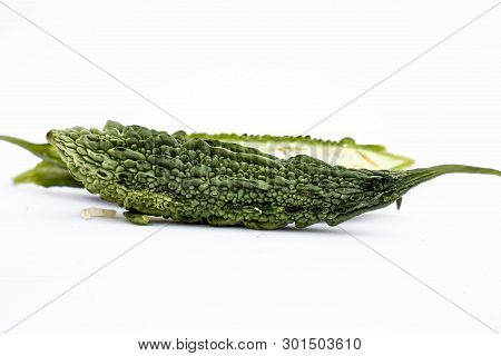 Raw Organic Bitter Melon Or Bitter Cucumber Or Bitter Gourd Isolated On White.