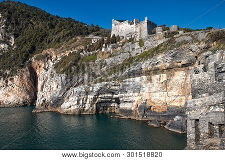 Ancient Fortress Doria On A Cliff Above The Sea In The City Of Porto Venere On A Sunny Day, Cinque T