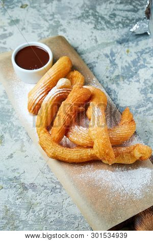 Churos Spanish Dessert. Gray Textured Background. Beautiful Serving Dishes. Dessert. Food Chain