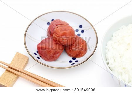 Japanese Food, Pickled Umeboshi With Cooked Rice On White Background