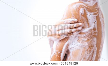 Women Are Taking A Bath And Have A Soap Bubble On The Body.