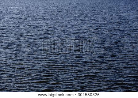Water Surface Clean Texture Background. Abstract Blue Water