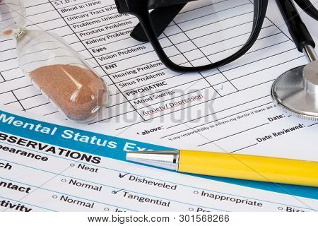 Photo From Scene Of Doctor Psychiatrist Or Psychologist Working Place Consulting Patient With Anxiet