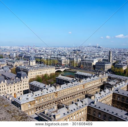 Roofs Of Paris Photographed From The Tower Of Notre-dame Cathedral. Aerial Shot, Space For Your Text