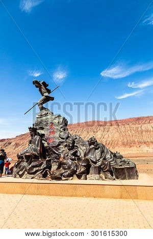 Aug 2017, Flaming Mountains, Xinjiang, China: Tourists Near A Statue From A Scene Of The Chinese Epi
