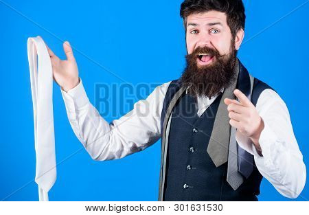 You Should Purchase It. Shop Assistant Pointing Finger And Offering Broad Assortment Of Neckties To 