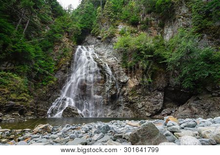 A Rushing Waterfall In The Forest Near Kitimat, British Columbia