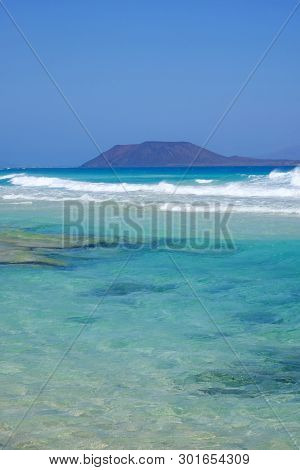 View On The Island Lobos From The Beach Corralejo On The Canary Island Fuerteventura, Spain.
