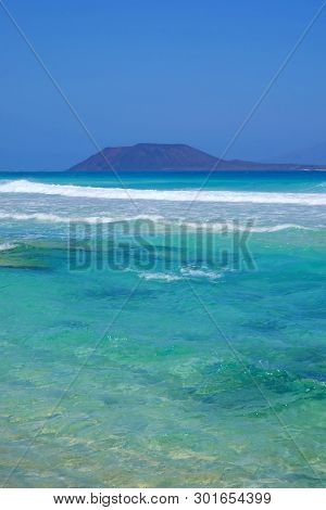 View On The Island Lobos From The Beach Corralejo On The Canary Island Fuerteventura, Spain.