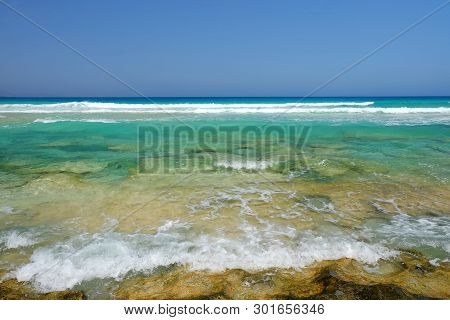 Transparent Ocean Water In Corralejo On The Canary Island Fuerteventura, Spain.