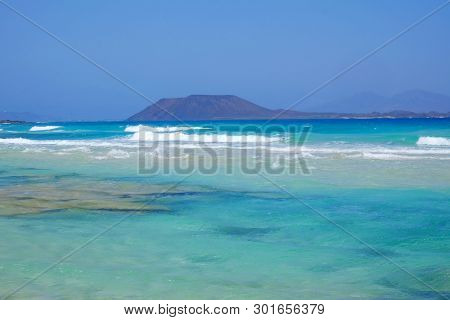 View On The Island Lobos From The Beach Corralejo On The Canary Island Fuerteventura, Spain.
