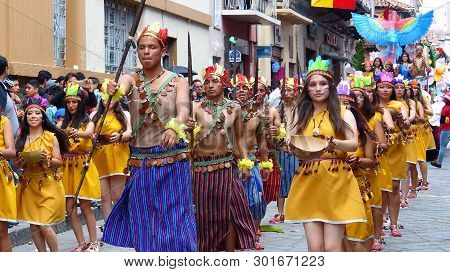 Cuenca, Ecuador - April 11, 2019: Folk Dancers Represent Indigenous Culture Of Shuar Tribe From Ecua