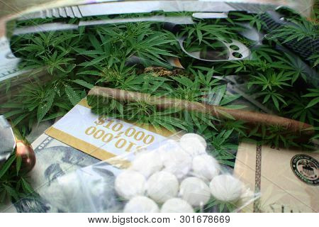 Mexican Cartel Concept With Money, Pills, Gun & Marijuana Leaves High Quality