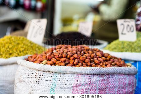 Heap Of Shelled Peanuts In A Gunny Bag With Price Tag Ready For Sale
