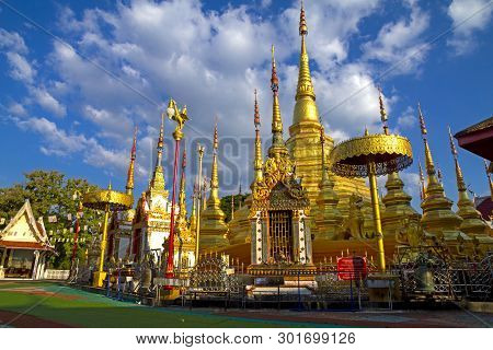 Architecture Gold Beautiful With Cloud And Blue Sky At Wat Phra Bat Ban Tak, Tak Province, Of Thaila