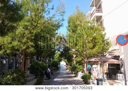 Agios Nikolaos. Crete, Greece - April 1, 2019: Road To The Sea, At Sunny Day
