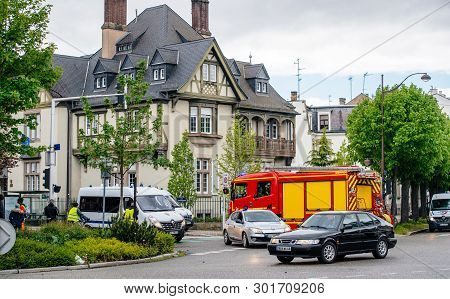 Strasbourg, France - Apr 28, 2019: Police Officers And Firefighter Truck Securing Entrance To Rue Sc
