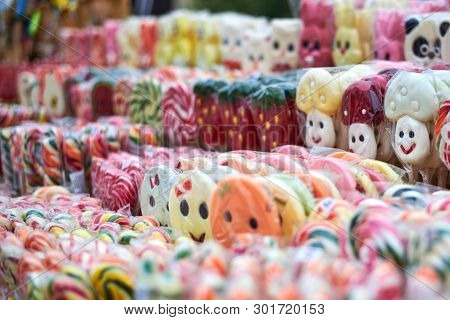 Tasty Colorful Lollipops Different Shapes On The Counter Fair, Beautiful Background