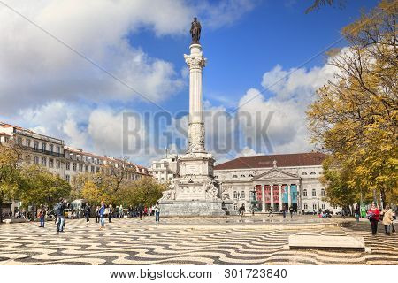 5 March 2018: Lisbon, Portugal - Historic Rossio Square, With The Column Of Pedro Iv, On A Sunny Day