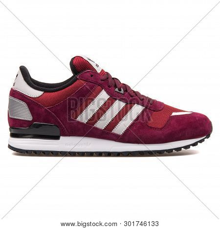 Vienna, Austria - August 10, 2017: Adidas Zx 700 Burgundy Sneaker On White Background.