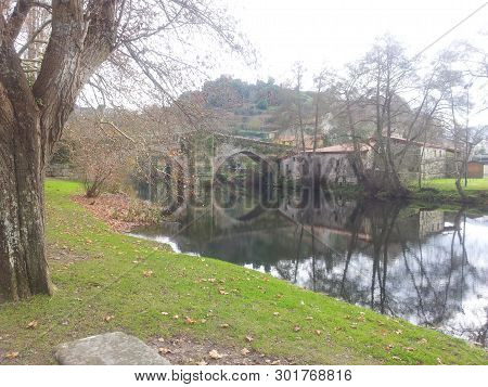 Roman Bridge Over The River Arnoia In Allariz (ourense)