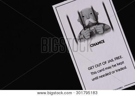 Newcastle, Australia - April 29, 2019  Get Out Of Jail Free Card From Monopoly, Isolated Against A B