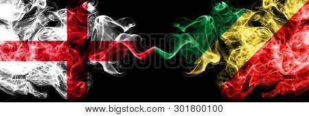 English Vs Congo, Congolese Smoky Mystic Flags Placed Side By Side. Thick Colored Silky Smokes Flag 
